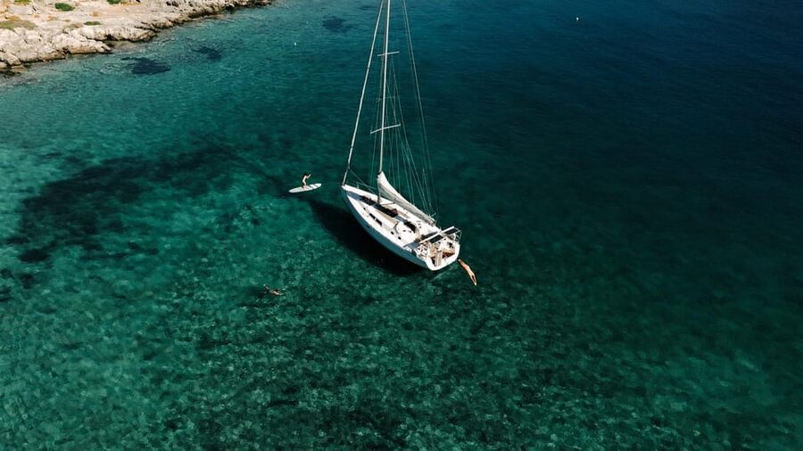 Agios Nikolaos: Golden Hour Sailboat Tour with Wine & Snacks - Sailing across Mirabello Bay