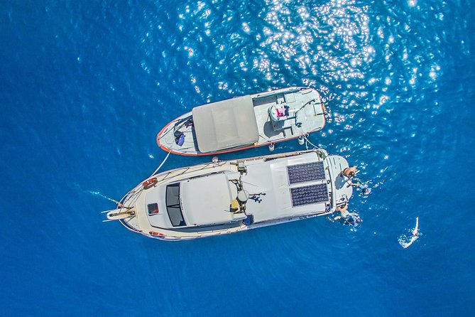 Boat Trip in Crete with Guided Snorkeling and Free Pick up! - Guided snorkeling for first-timers