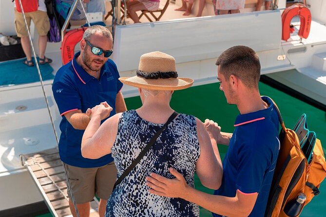 Chania: Afternoon Catamaran trip - Dinner, Drinks & Sunset - Finding a quiet bay at Agioi Theodoroi