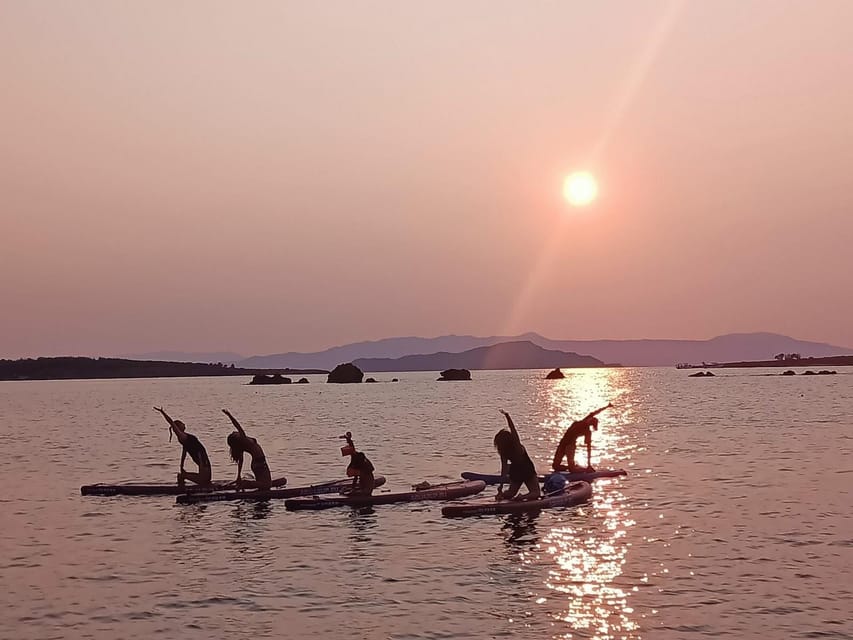 Chania: Morning or Sunset Stand-up Paddleboard Pilates - Following Dimitra through the one-hour class
