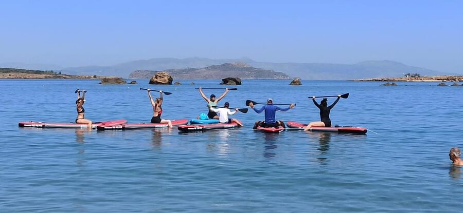 Chania: Morning or Sunset Stand-up Paddleboard Pilates - Learning to balance before the Pilates begins