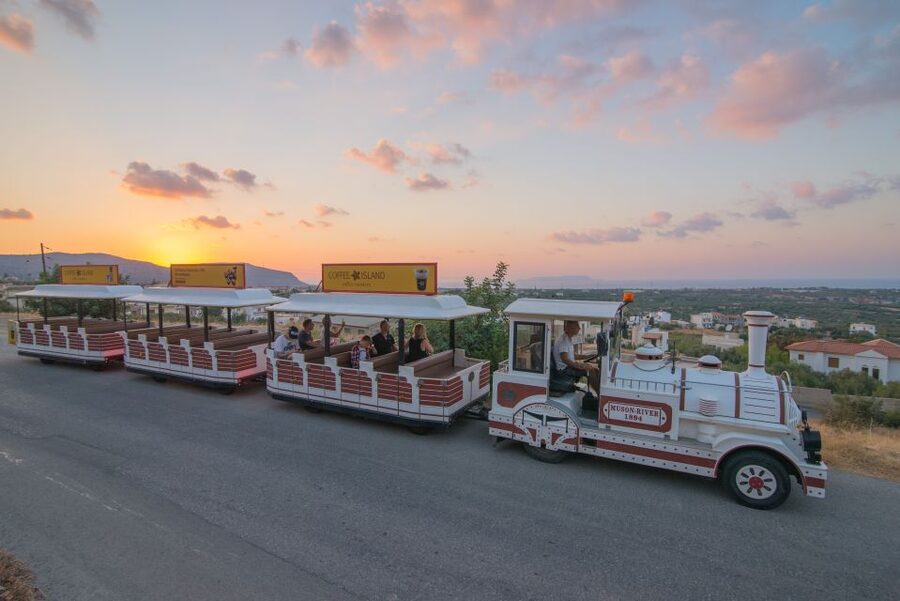 Chersonissos: Mini-Train City Highlights Tour - Boats and water at the port