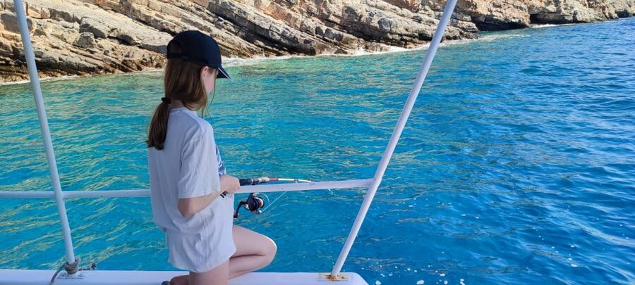 Crete: Fishing & Swimming Boat Cruise with Lunch & Drinks - Fresh fish lunch prepared onboard