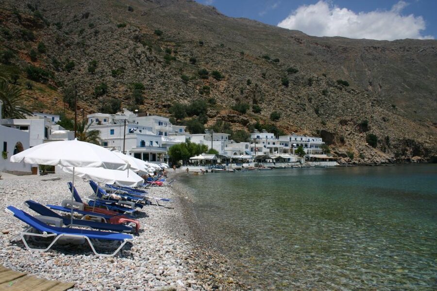 Crete: Roundtrip Boat Ride to Loutro with Hotel Transfer - Boarding the taxi boat at Chora Sfakion