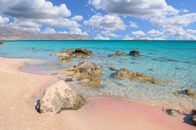 Day Tour to Elafonisi Beach from Heraklion with Pickup Included - Sunbeds, shade, food, and the pink sand
