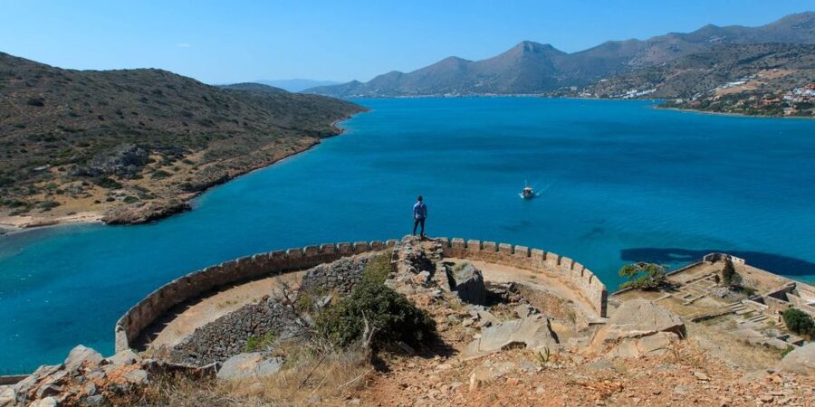 From Rethymno: Agios Nikolaos and Spinaloga Tour - Boarding the boat at Elounda