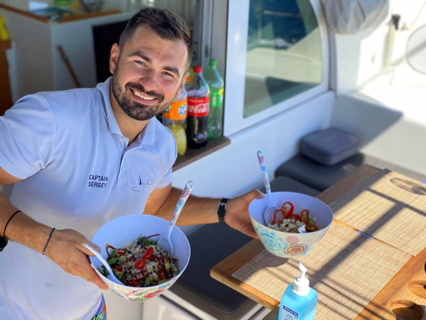 Heraklion: Dia Catamaran Tour - Lunch, Open Bar & Snorkeling - A Mediterranean lunch cooked on board
