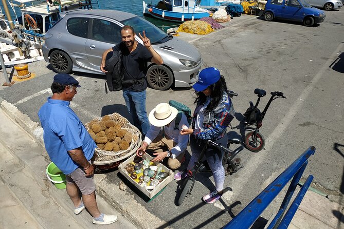 Heraklion Ecobike Tour & Cretan Wine Tasting Experience - The old Venetian harbor beside the waves