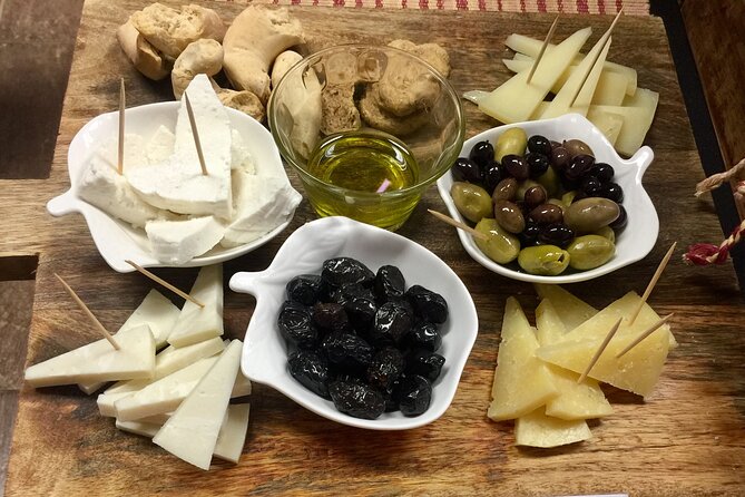 Heraklion Food Stories Walking Tour with 8 local-favorite stops - A sit-down Cretan dish, with snails for the brave