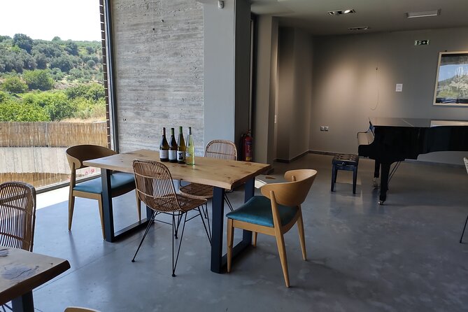 Heraklion SUV Private Guided Wine Tour with Lunch - Lyrarakis Winery: vineyard views and a long Cretan lunch