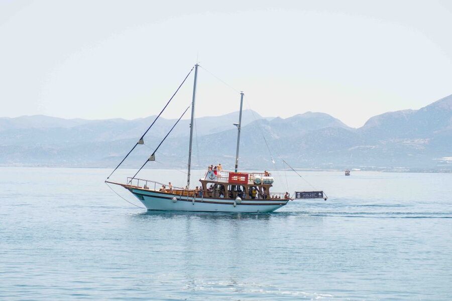 Hersonisos: Boat Cruise with Swim Stops and Lunch - Grilled lunch with a view