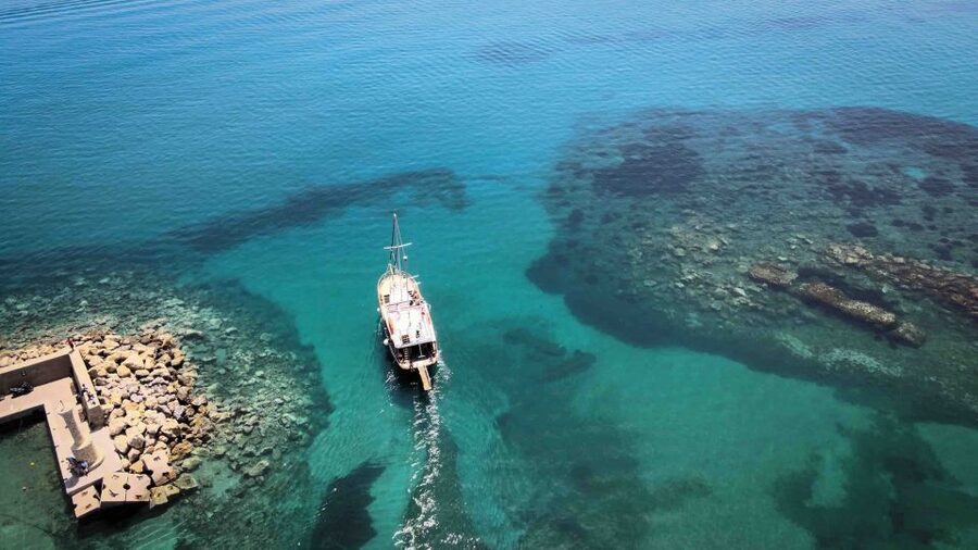 Hersonisos: Boat Cruise with Swim Stops and Lunch - The longer stop near Stalis