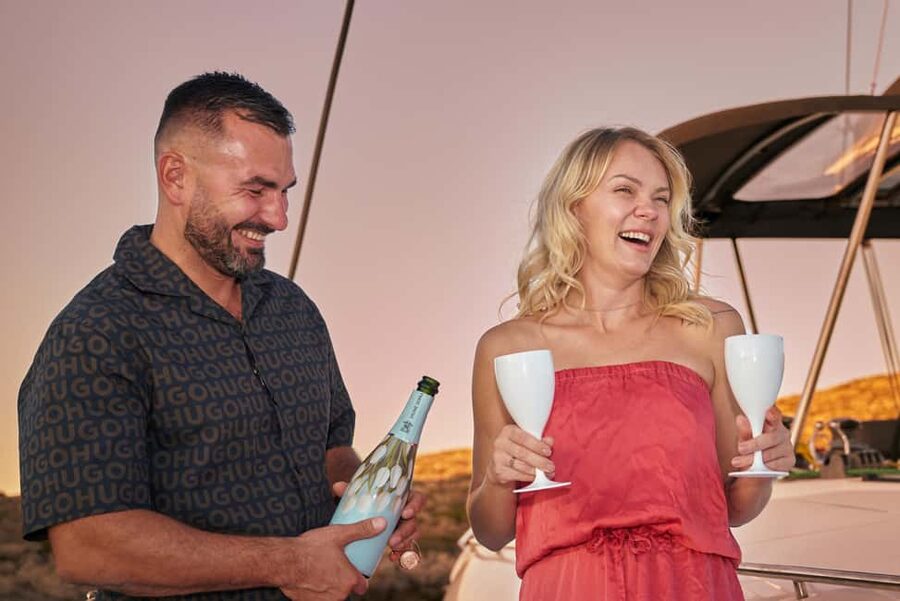 Hersonissos: Sunset Catamaran Cruise with Snacks and Drinks - Agios Georgios Bay: the main active stop