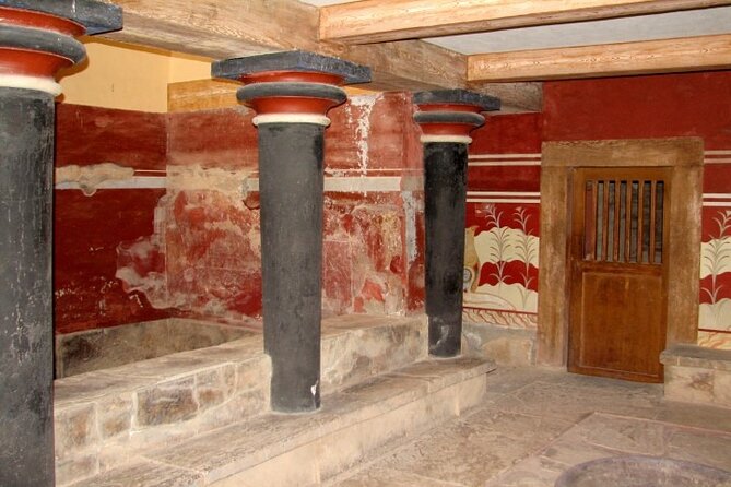 Knossos & Heraklion City Day Tour from Rethimno - Reading the restored palace at Knossos