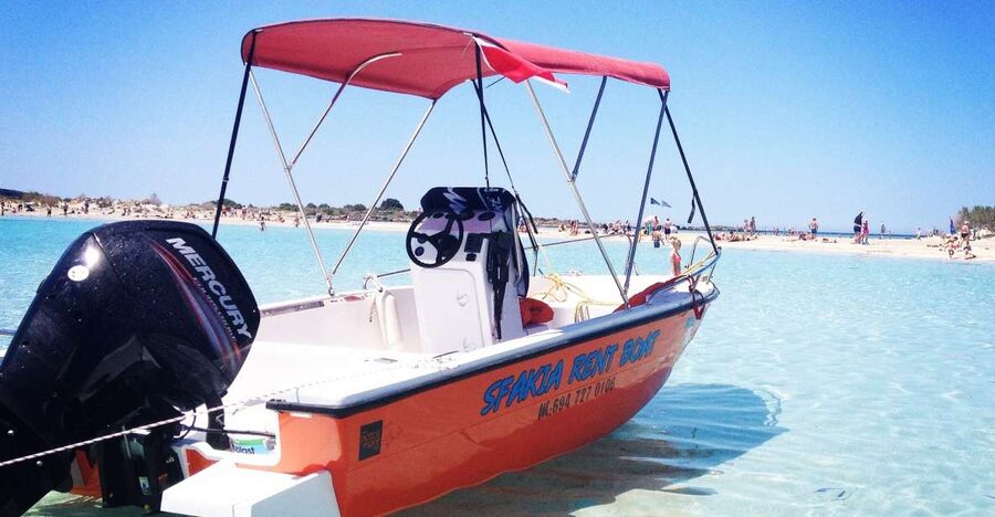Marathi: Private Boat Rental - Taking the wheel from Marathi Bay