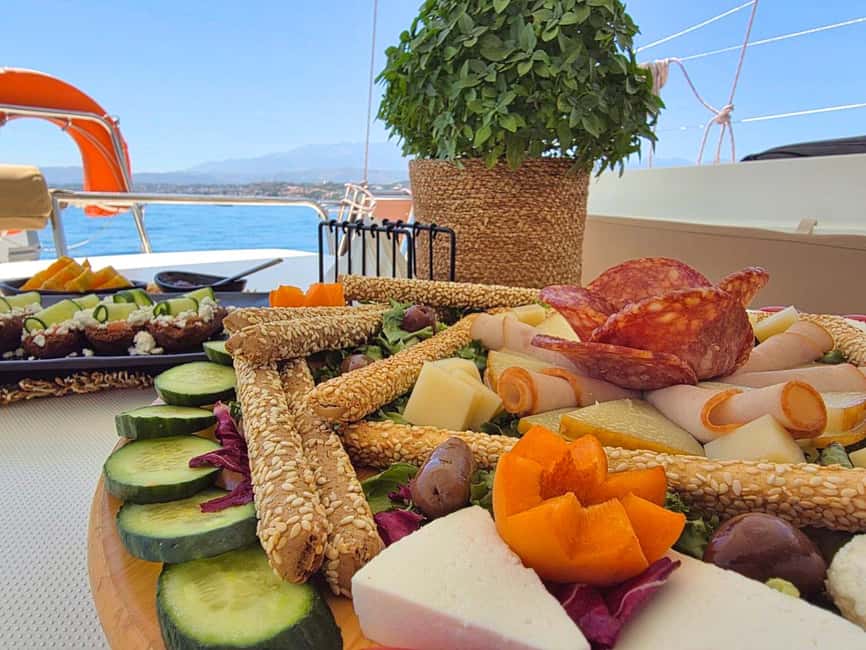 Panormo: Sunset All-Inclusive Catamaran Cruise with Snacks - What the $96 price includes