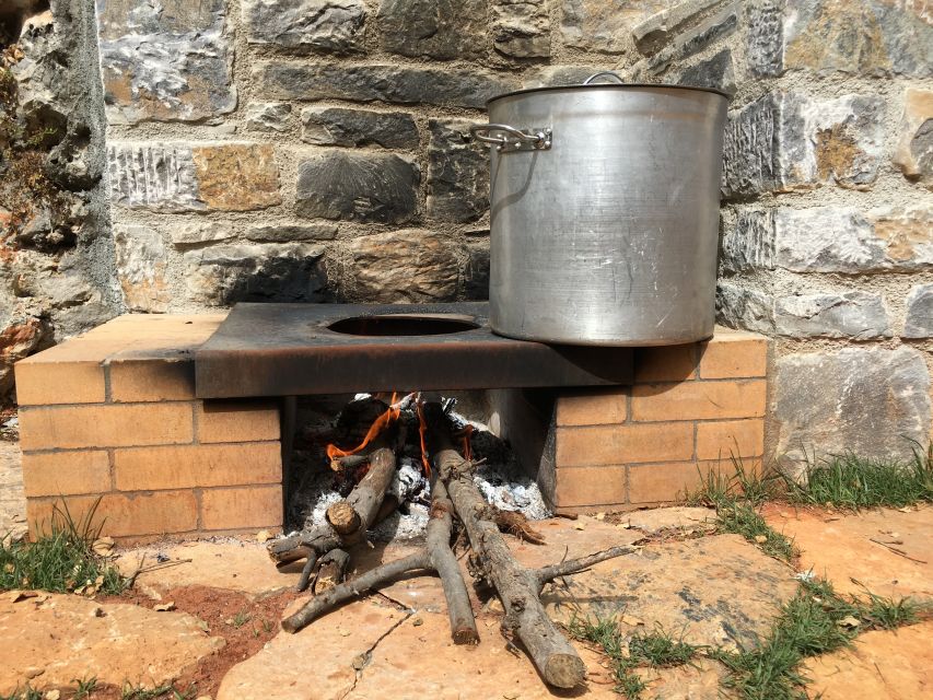 Rethymno 4x4 Safari: Tastes & Farm Experience - Lunch in Axos, with a table full of Cretan dishes