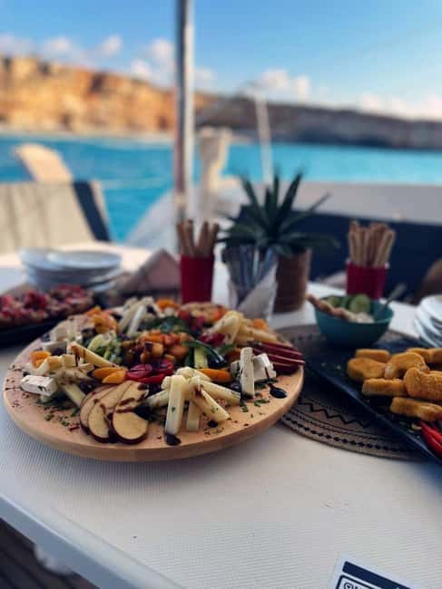 Rethymno: Sailing Catamaran Cruise with Meal & Drinks - Shade, sea conditions, and practical comfort