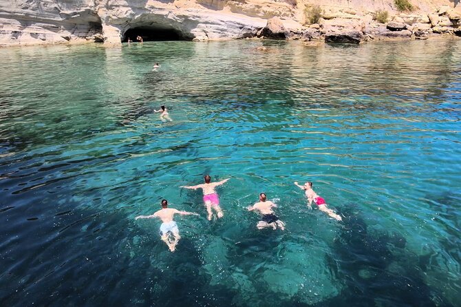 Sailing Trips with Cretan Sailing - Swimming near Stalis and the fresh fruit platter